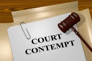 Render illustration of Court Contempt title on Legal Documents